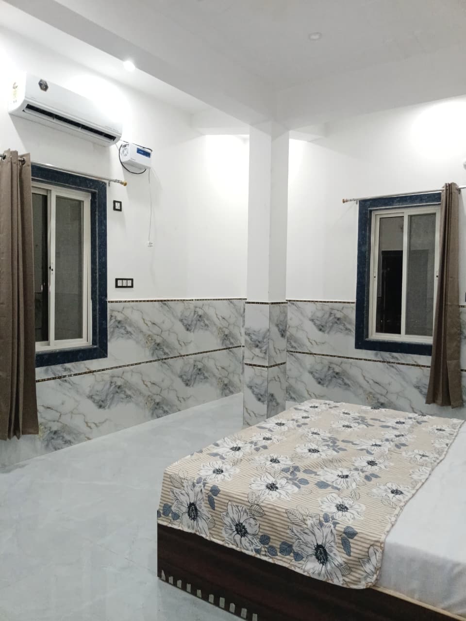 Air-conditioned room with two windows